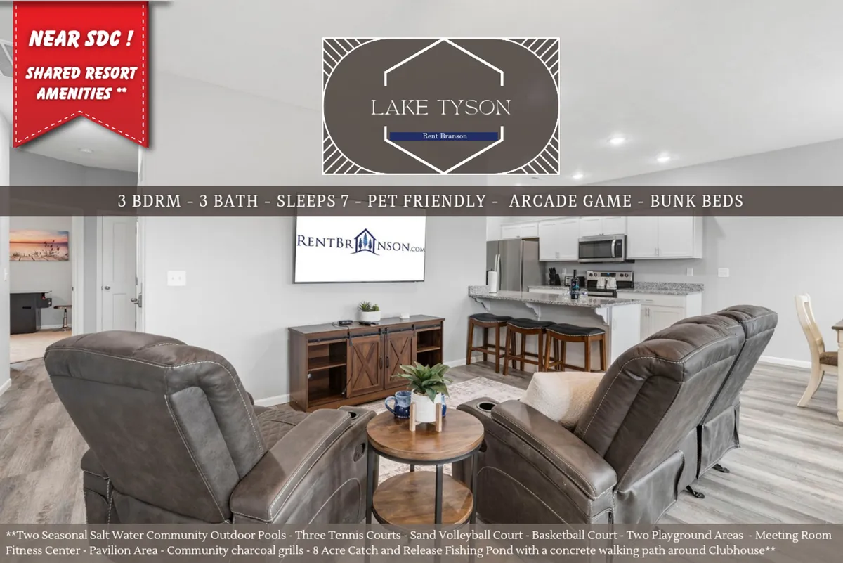 A family-friendly recreation area featuring a comfortable seating area, a classic arcade game, and a connected dining space. The room feels welcoming and fun, encouraging guests to gather for game nights or relaxed socializing.